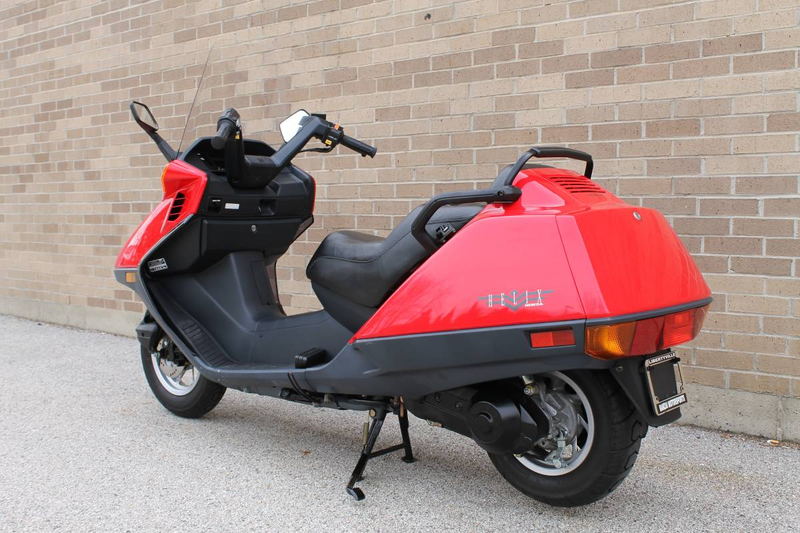 Illustration for article titled At $2,499, Could This Incredibly Low Mileage 1999 Honda CN250 Helix Get You To Scoot?